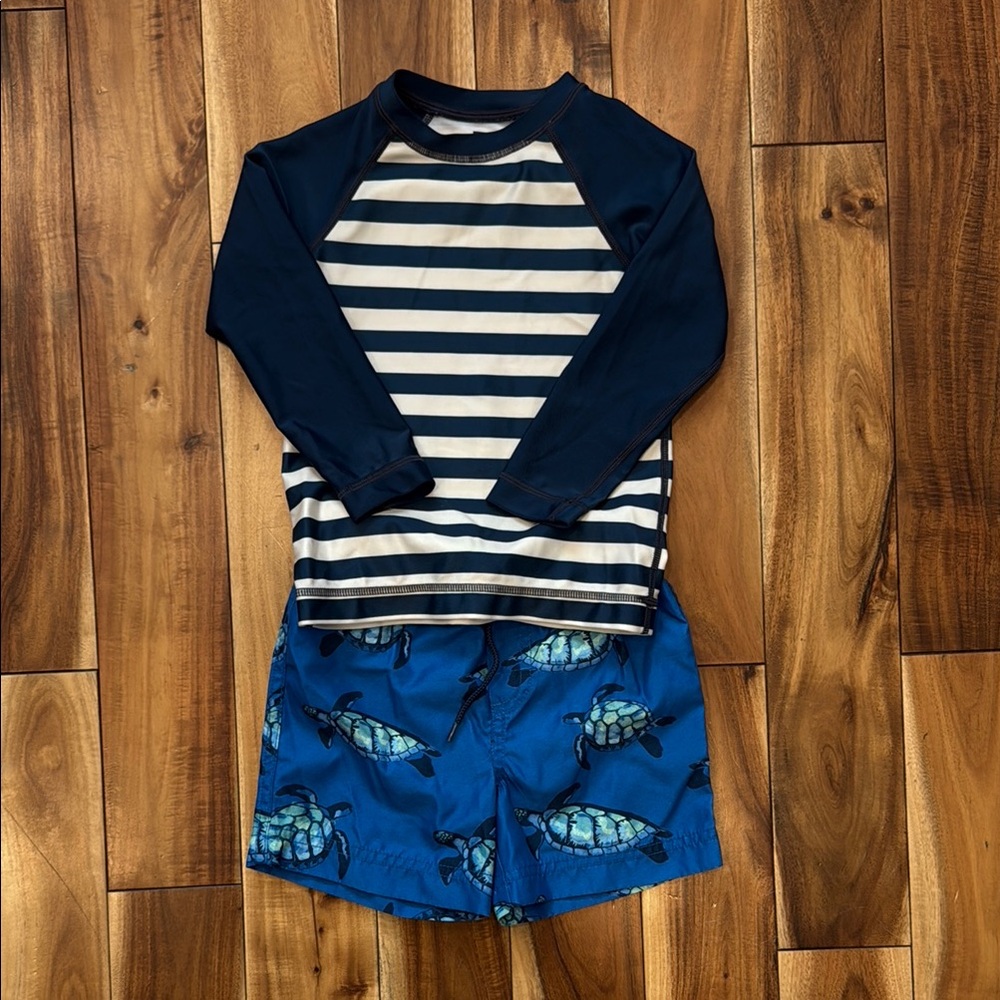 Tea Collection - Striped Navy and White Rash Guard with Turtle Print Shorts